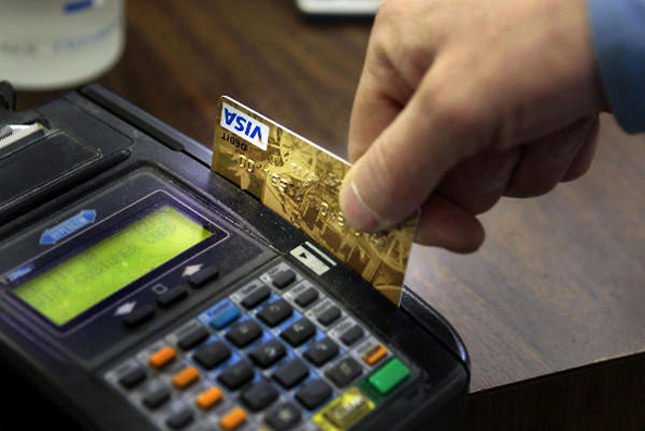 Banks, Retailers Fight on over Debit Card Interchange Fees