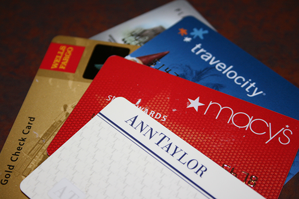 Americans' Credit Card Debt Slightly Up, Credit Scores Keep Falling