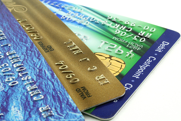 Americans Get More Credit Cards, Pay on Time and Keep Balances Low